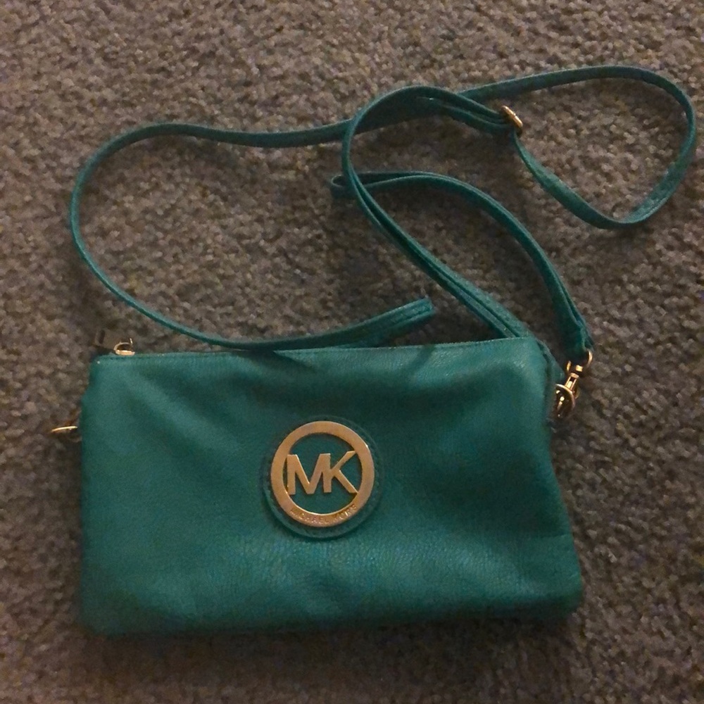 Micheal kors blue off the shoulder or clutch